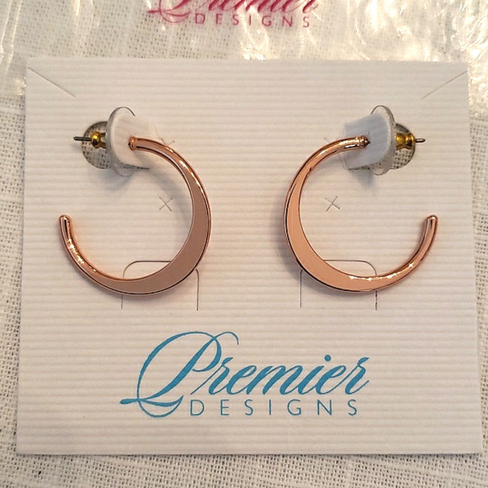 Rose-gold colored earrings
